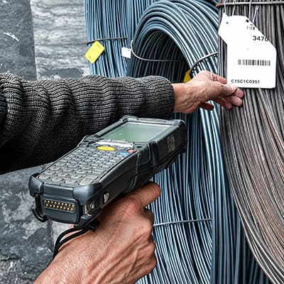 Transport Logistik GmbH - Full Service Logistic aus Iserlohn - Kommissionierung von Stahldraht mit Scanner